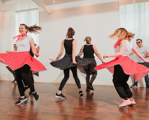 Rock & roll workshop bij Paaldansstudio & Dance Centre - Leer swingende moves en energieke grooves - ervaar de ultieme dansbeleving!